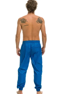 Wind Breakers | Aviator Nation MEN'S 4 STRIPE WIND PANT - SNORKEL BLUE SNORKELBLUE